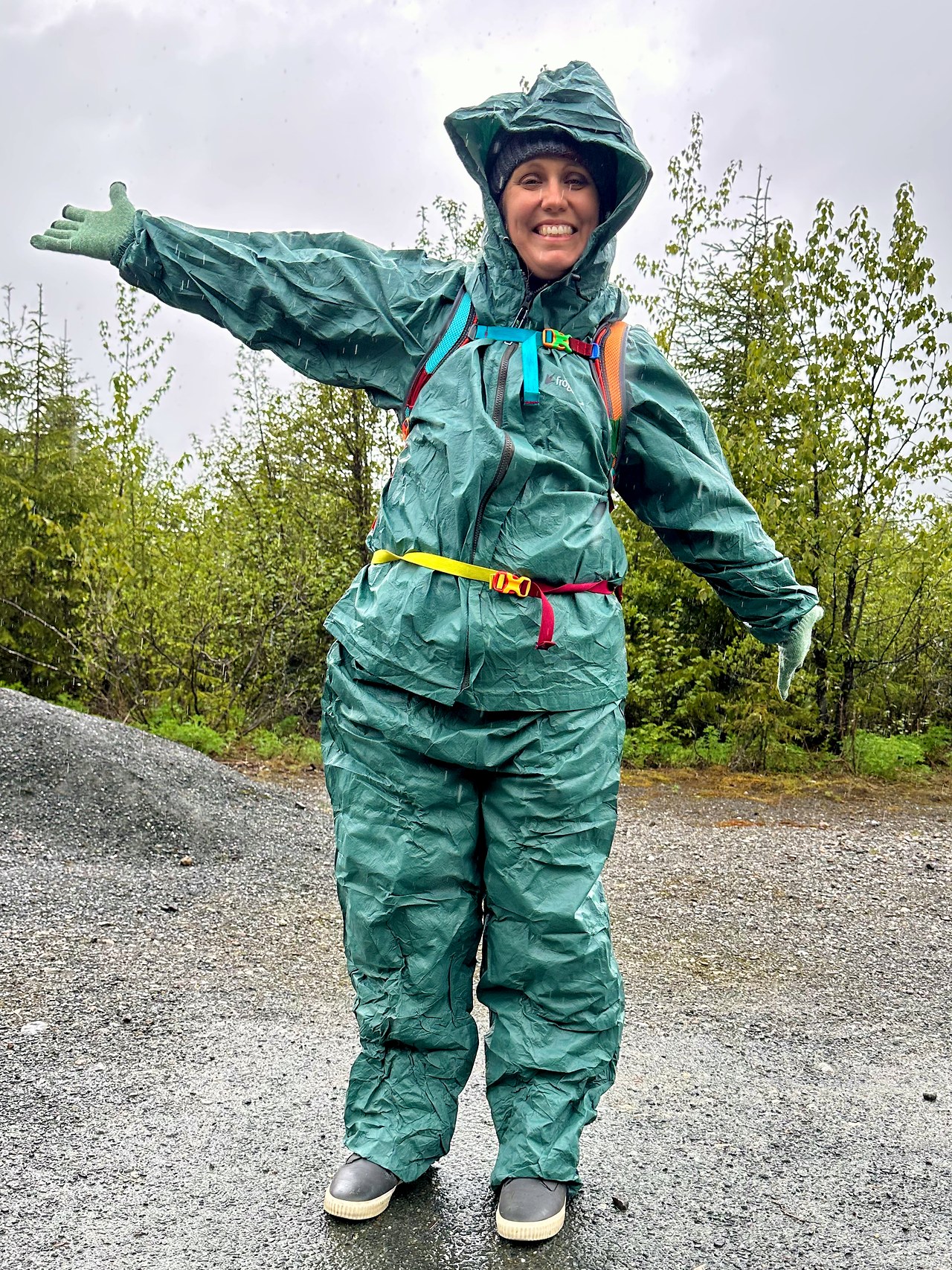 Stacy wearing Frog Toggs rain suit in heavy Alaska rain conditions