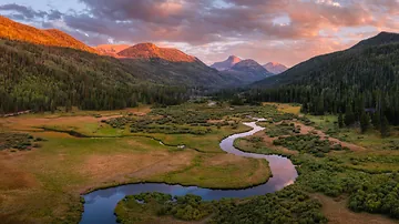 Mountain valley landscape symbolizing exploration and connection with nature