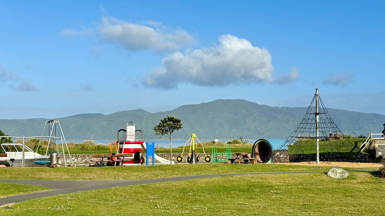 View of Kapiti Island across the water from a coastal park on the Kapiti Coast in New Zealand.