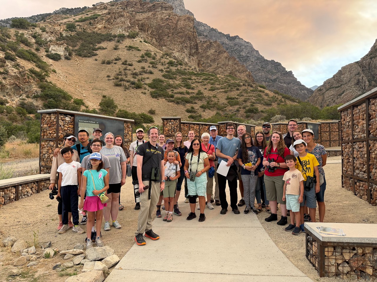 FeatherQuest and Provo City Library field trip participants gathered for a group photo at the Rock Canyon trailhead