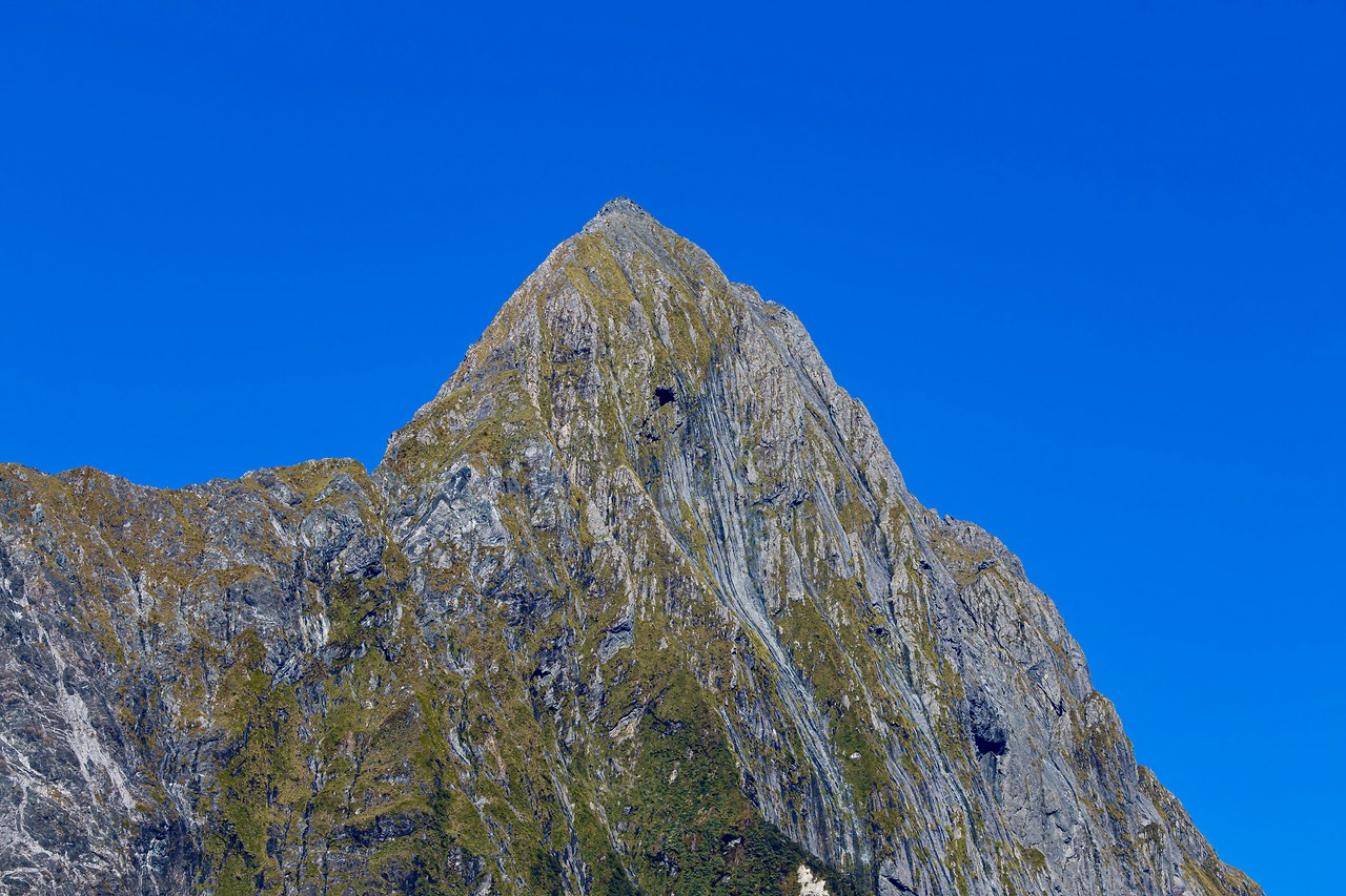 Close-up of Mitre Peak towering above Milford Sound