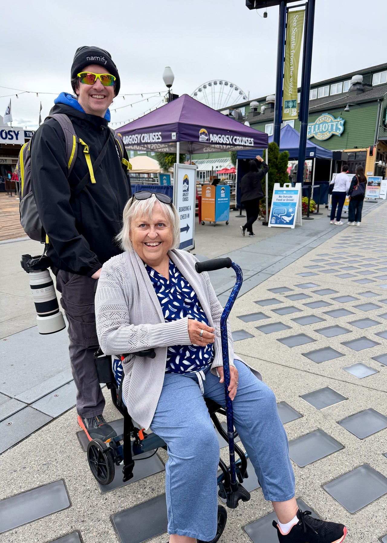 Mike and Stacy's mom together on the Seattle waterfront with her wheelchair